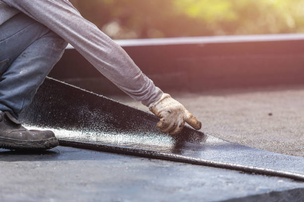 Professional Exterior Waterproofing technician working in Greenville, MI